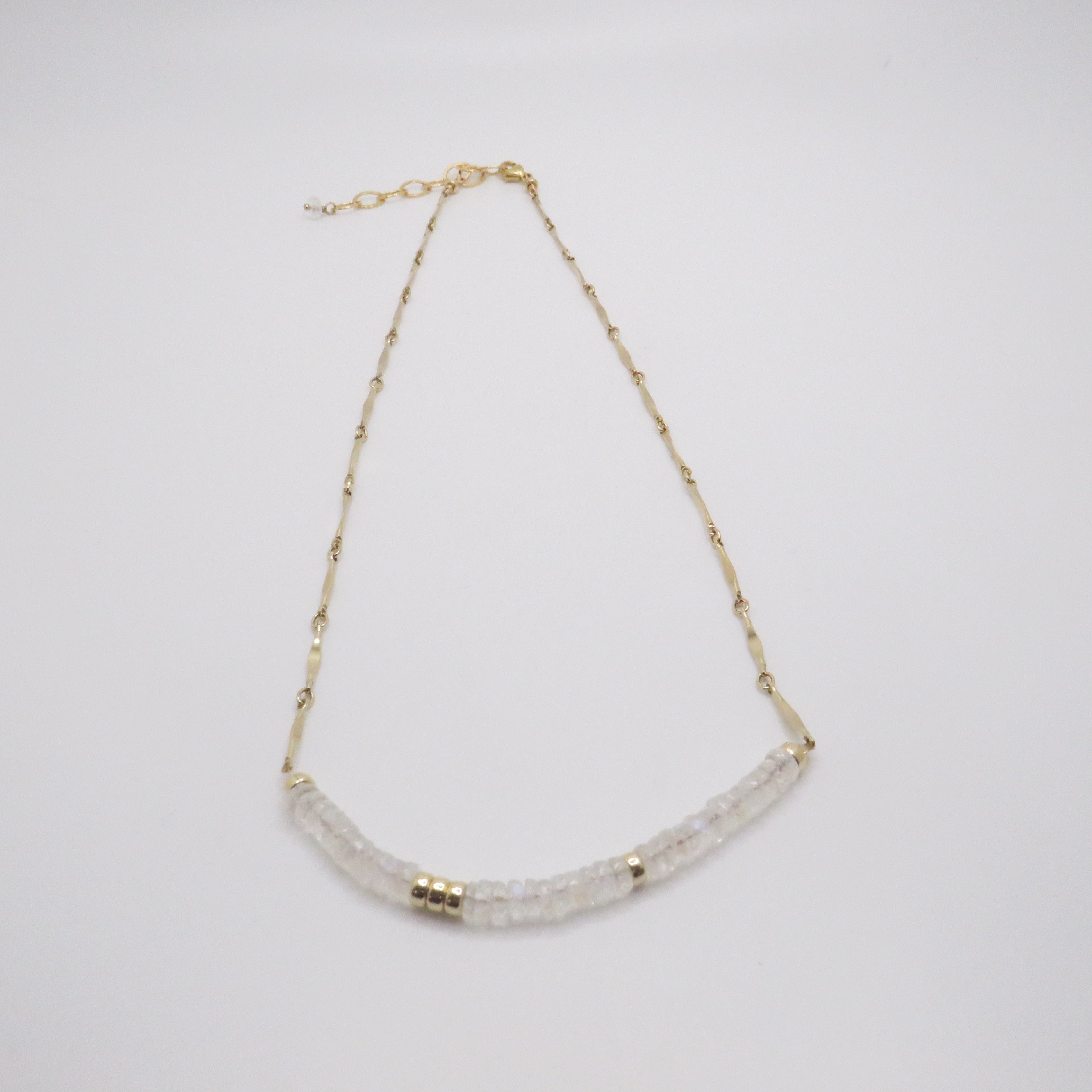white and gold beaded necklace