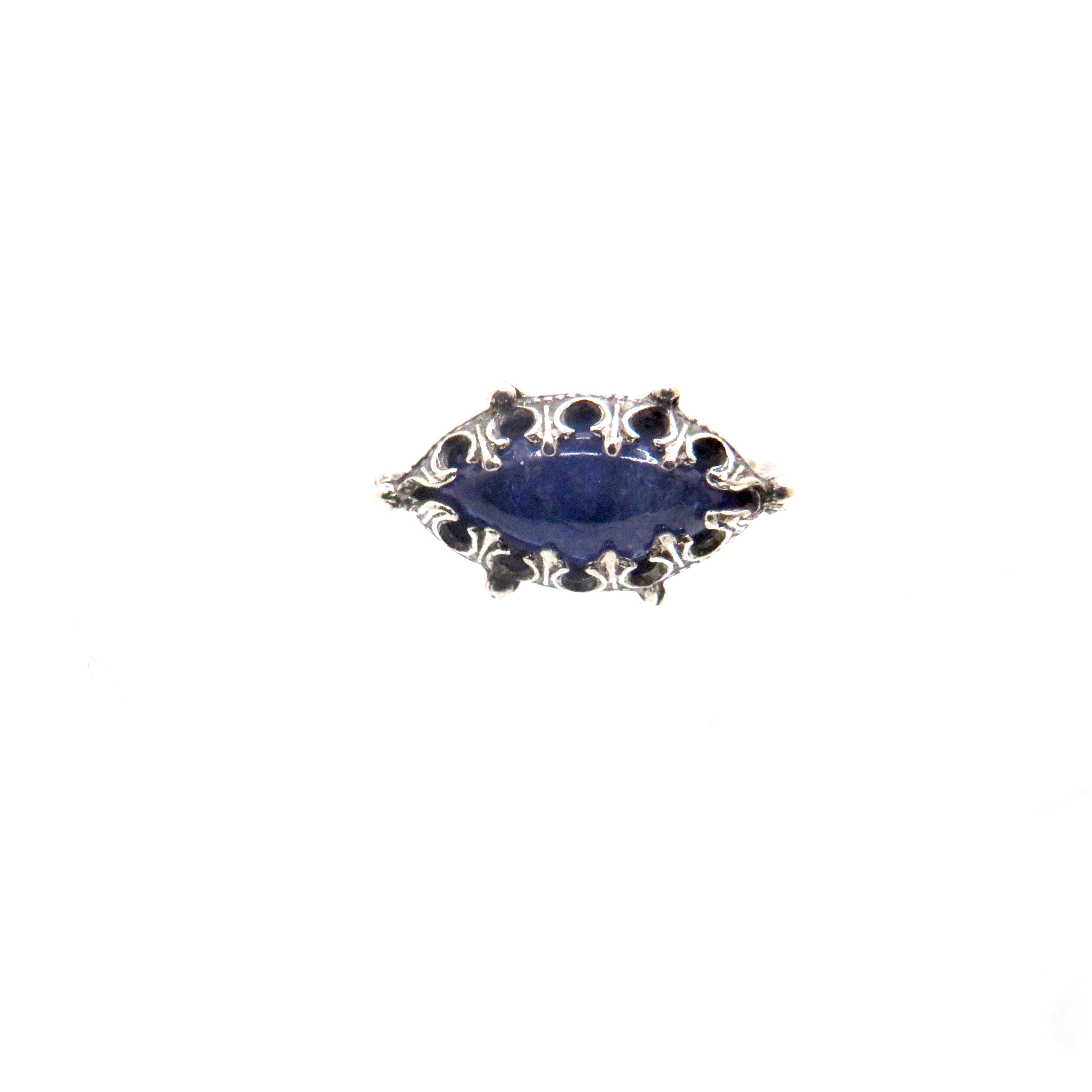 silver ring with blue gemstone