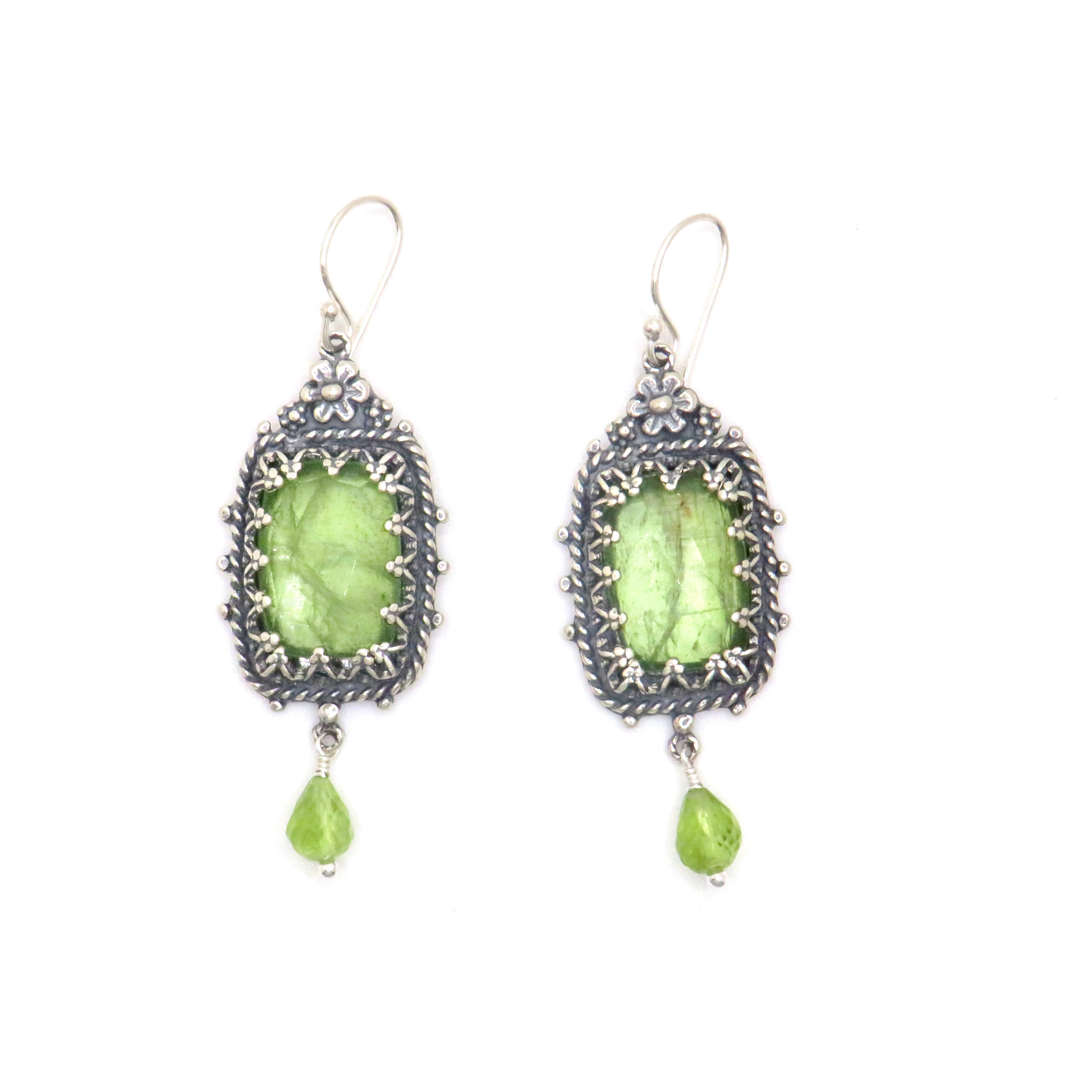 silver earrings with green gemstone