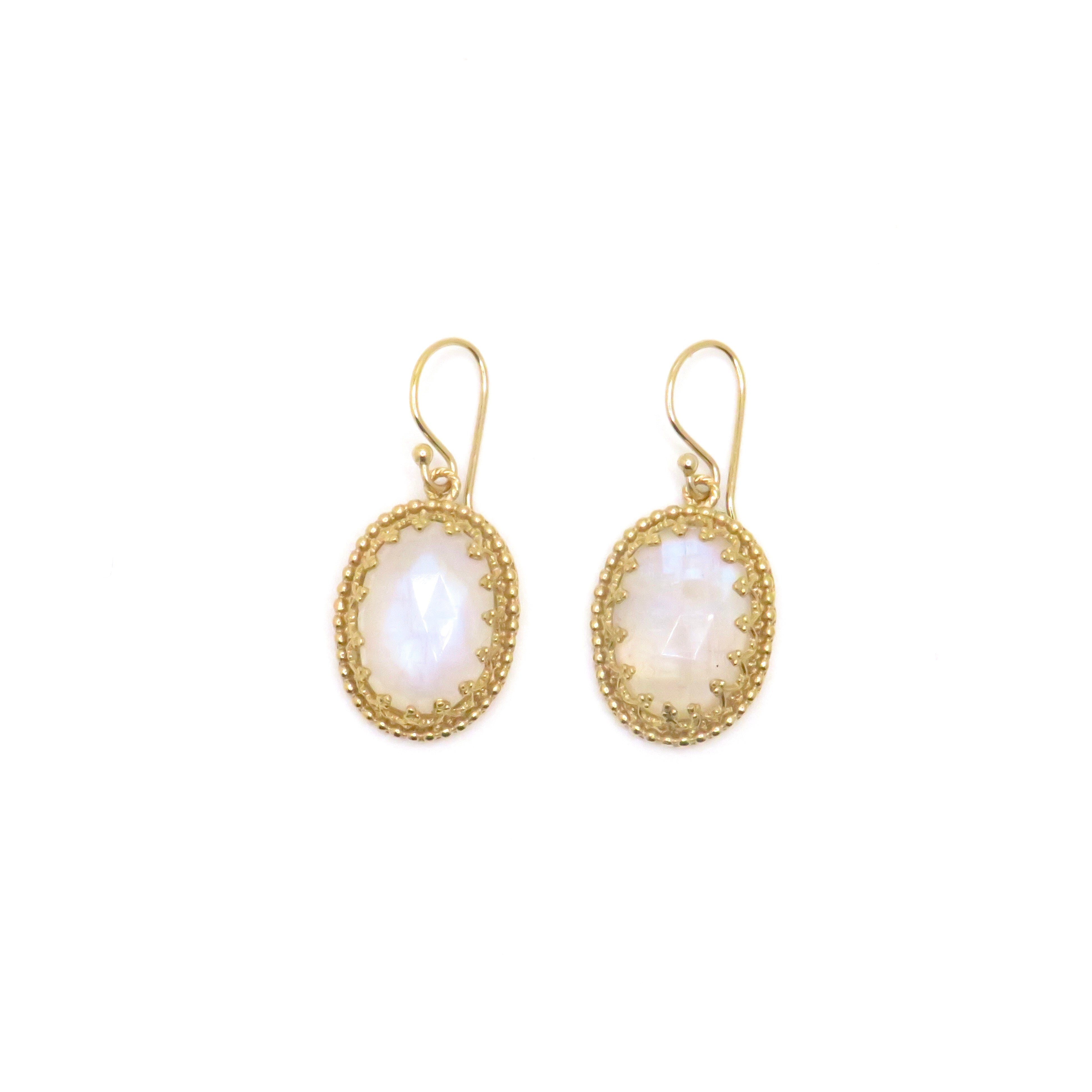 gold drop earrings with white gemstone