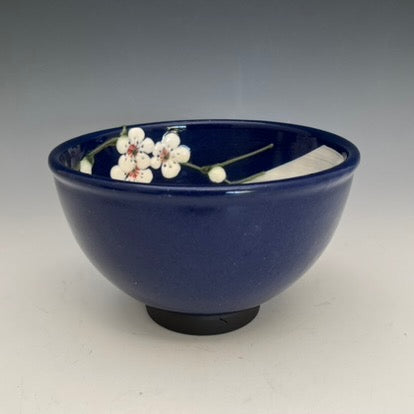 Japanese style clay bowls with painted flowers