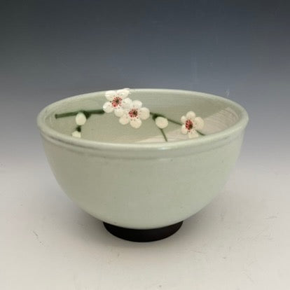 Japanese style clay bowls with painted flowers