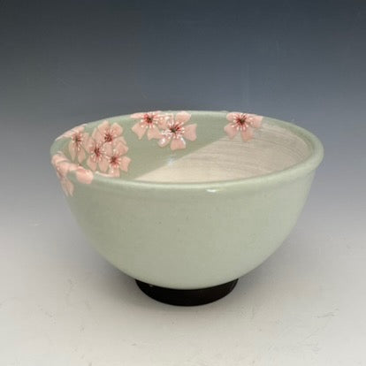 Japanese style clay bowls with painted flowers