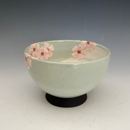 Japanese style clay bowls with painted flowers