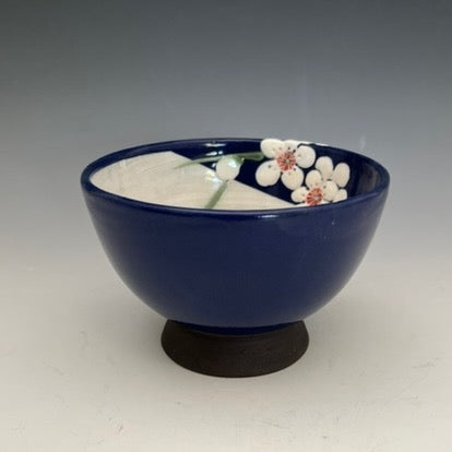 Japanese style clay bowls with painted flowers