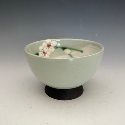 Japanese style clay bowls with painted flowers