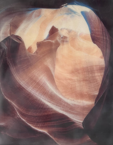 Abstract photo encaustic artwork by Hearts for the Arts titled 'Hearts for the Arts | For the Love of Light! (Antelope Canyon)', featuring a heart-like shape in warm, earthy tones, inspired by the beauty of Antelope Canyon.