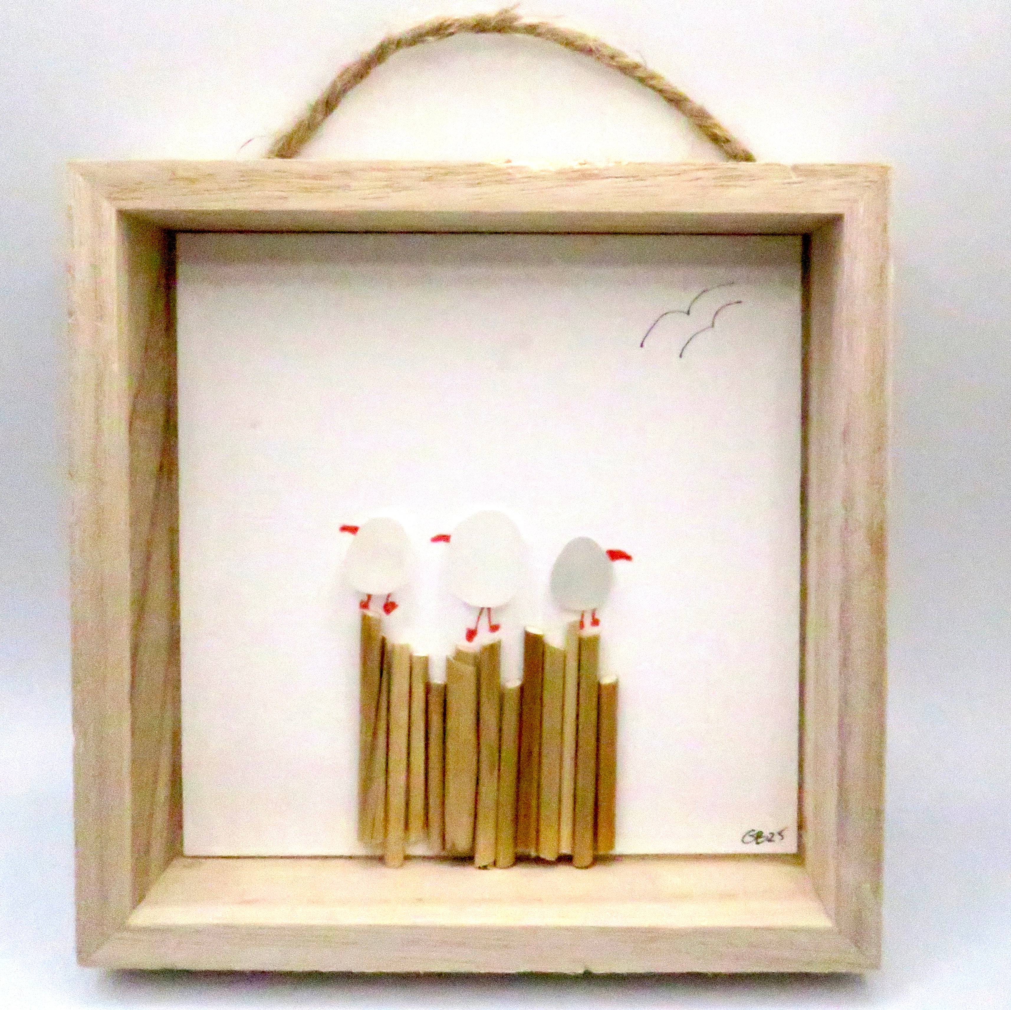 Seaglass painted birds in a wood frame