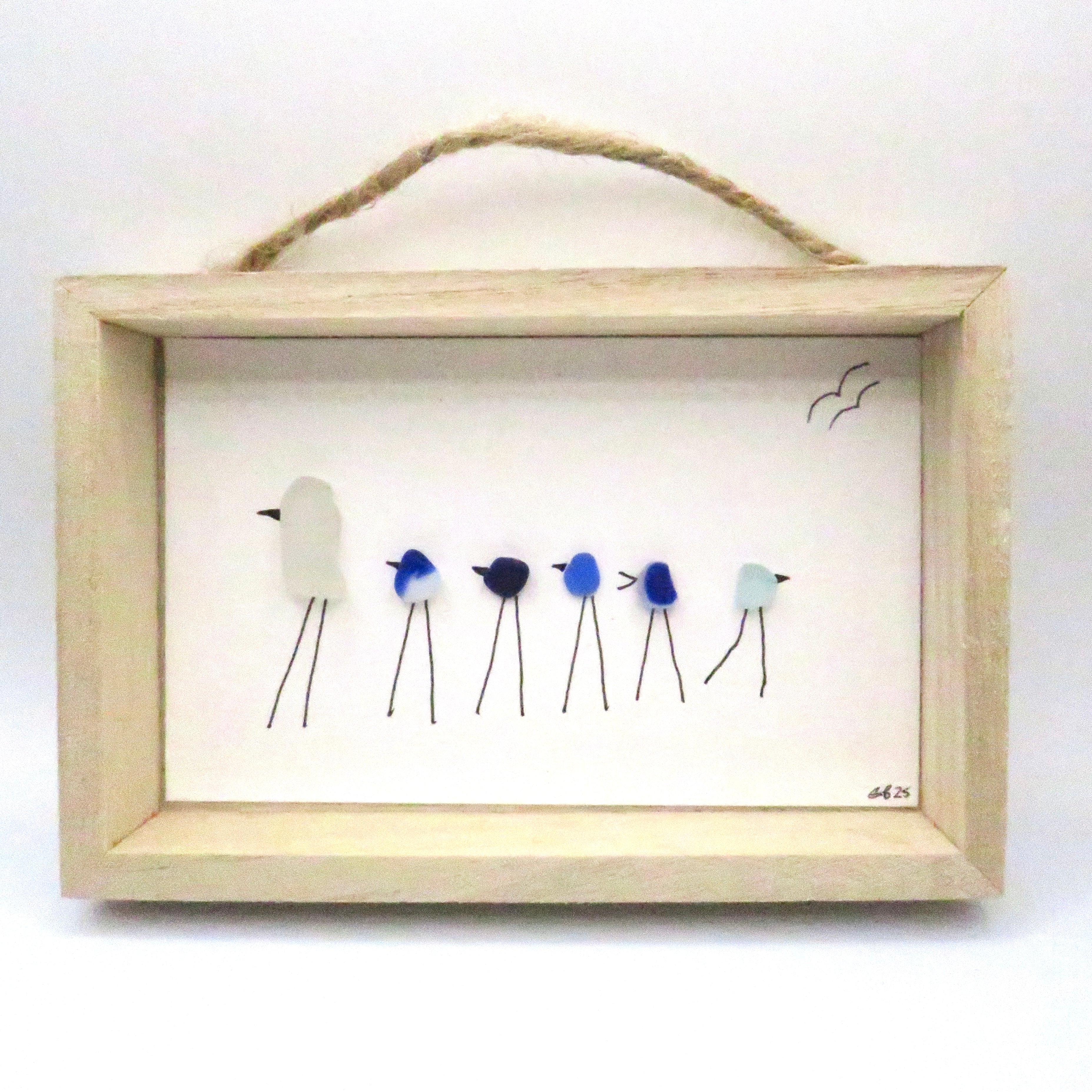 Seaglass painted birds in a wood frame