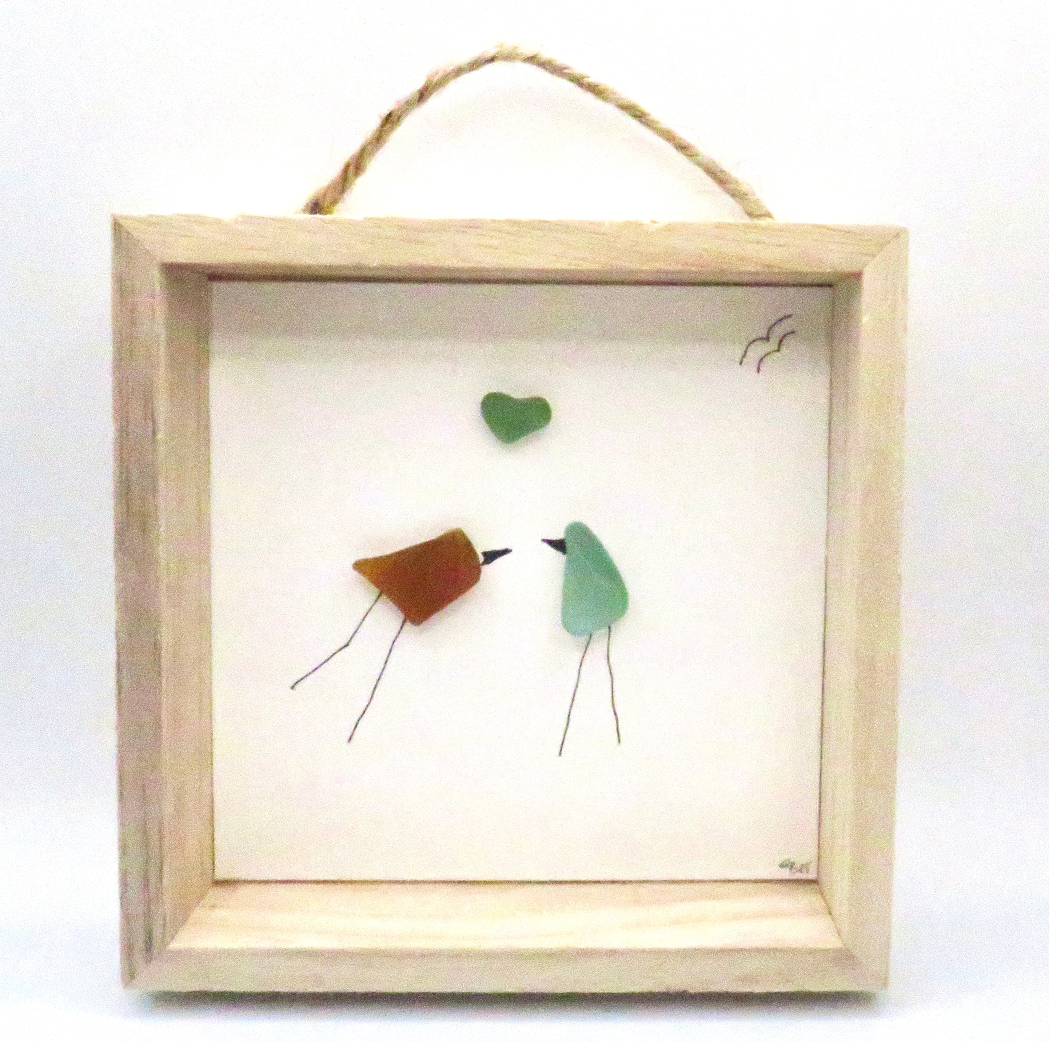 Seaglass painted birds in a wood frame