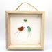 Seaglass painted birds in a wood frame