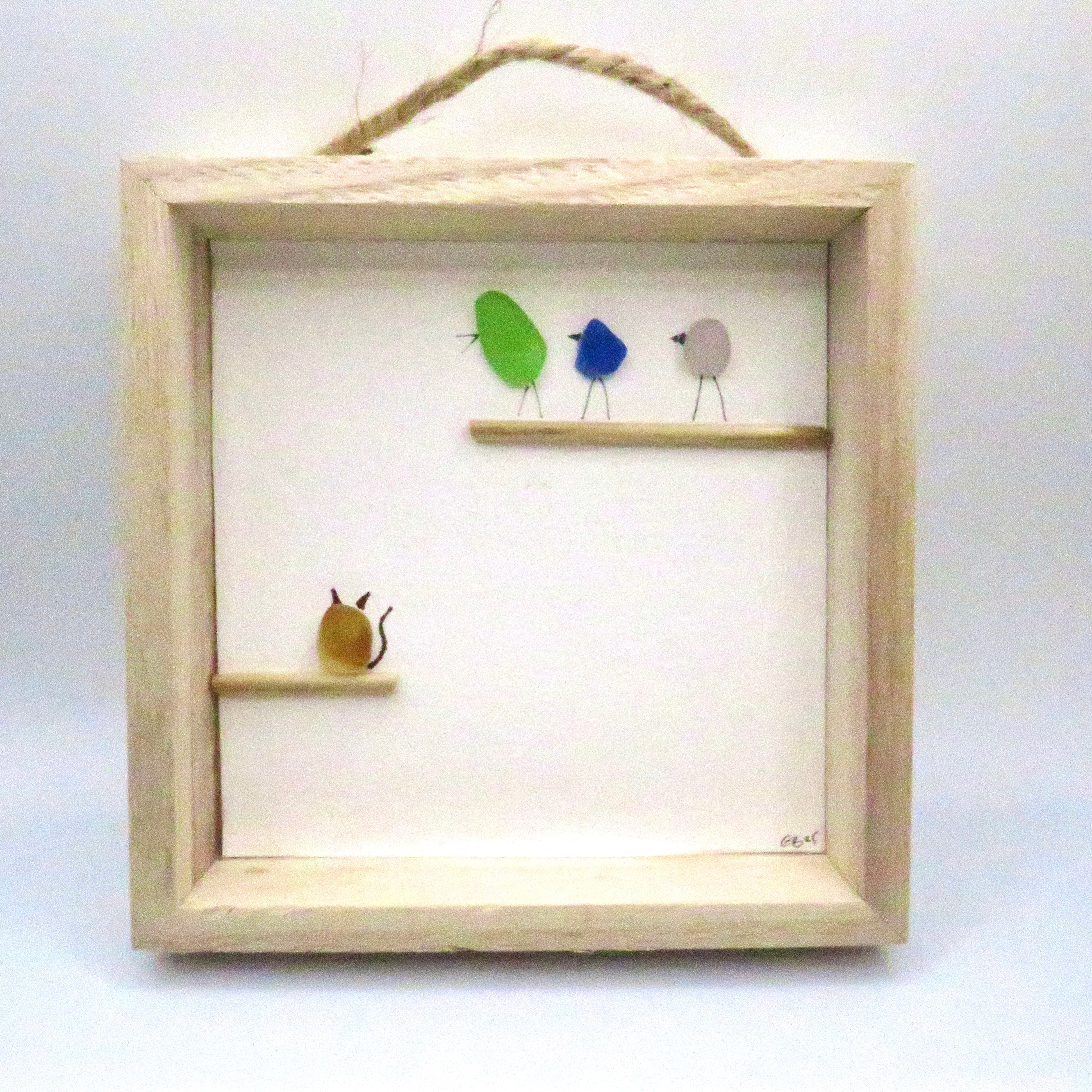 Seaglass painted birds in a wood frame