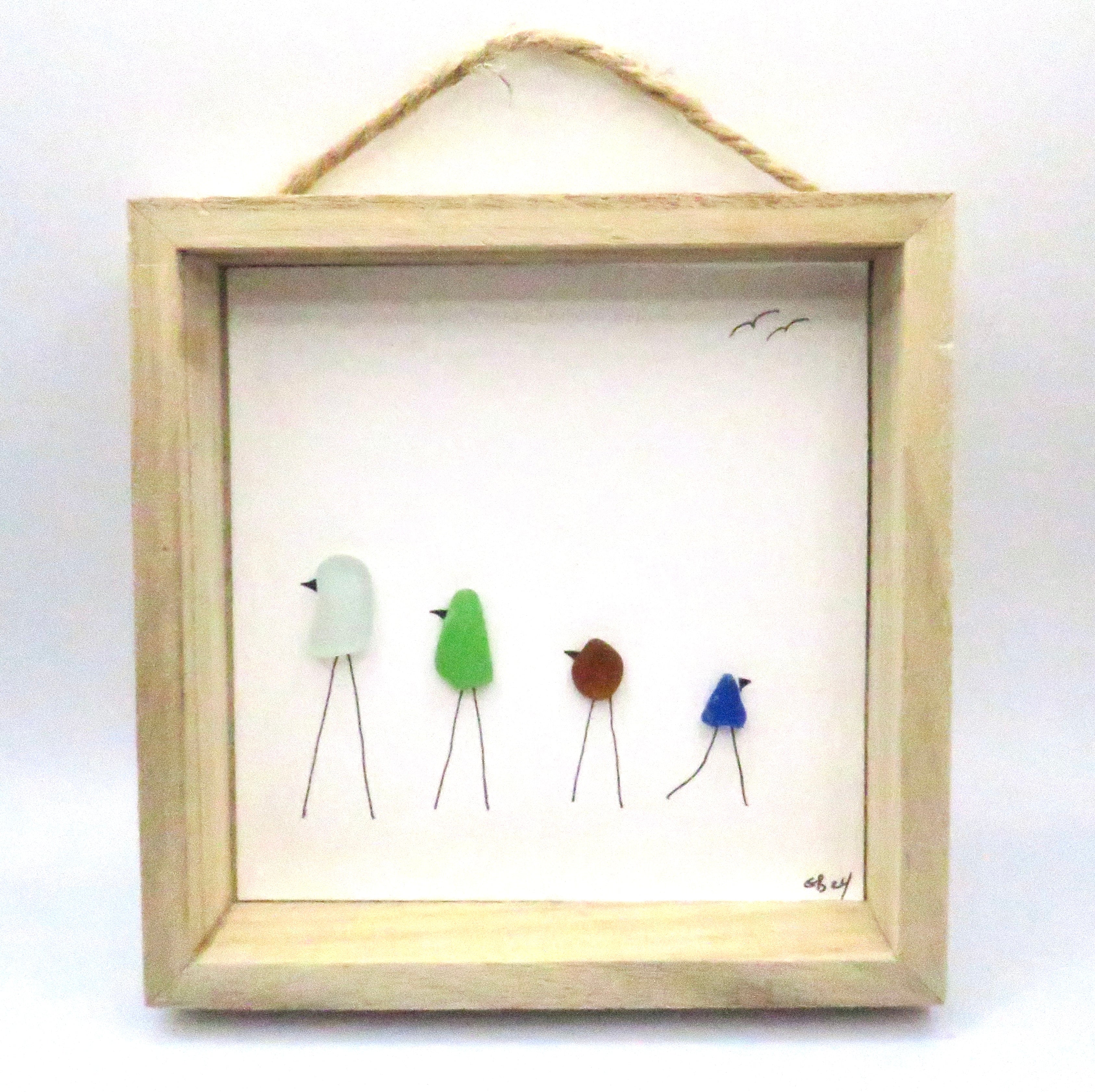 Seaglass painted birds in a wood frame