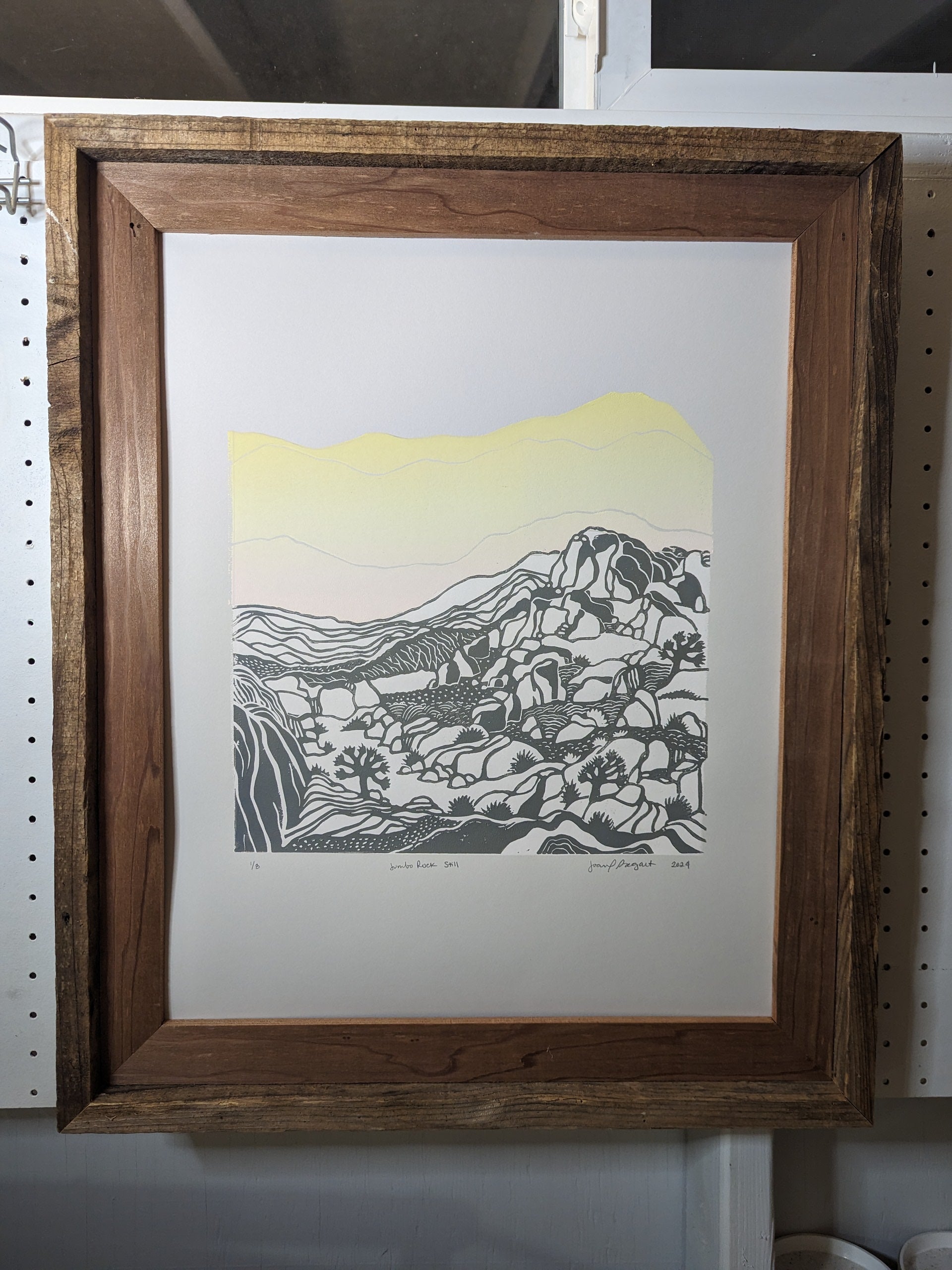 Large rock print in wood frame