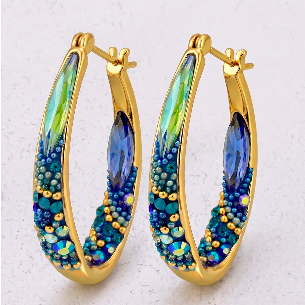 Shine bright like your favorite reality show star with these KE-8315 18K Gold Plate Crystal Hoop Earrings, perfect for turning heads and sparking envy!