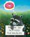 Framed artwork titled 'Please Don’t Feed the Wildlife' by Michelle Waters, measuring 11x14 inches.