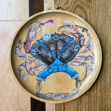 dungeness crab painted on wood