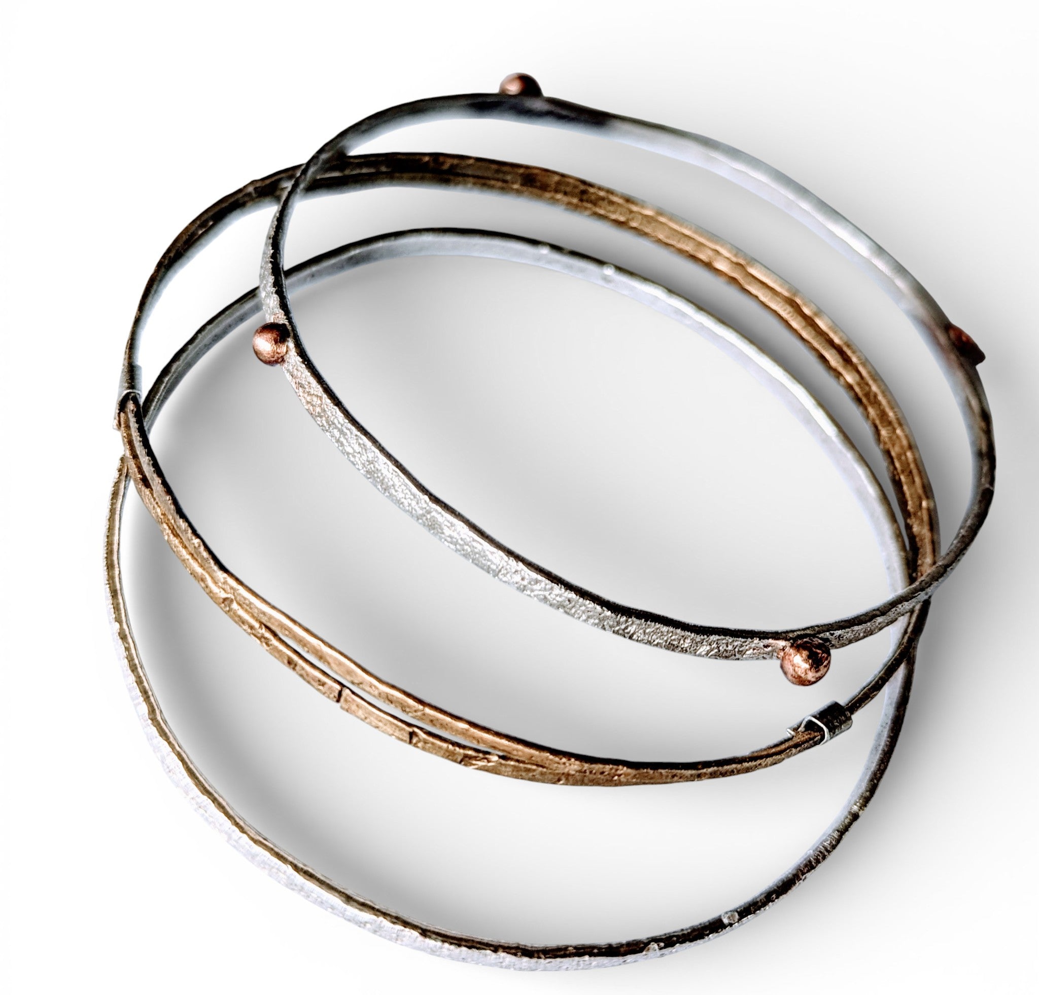 Set of three bangles.