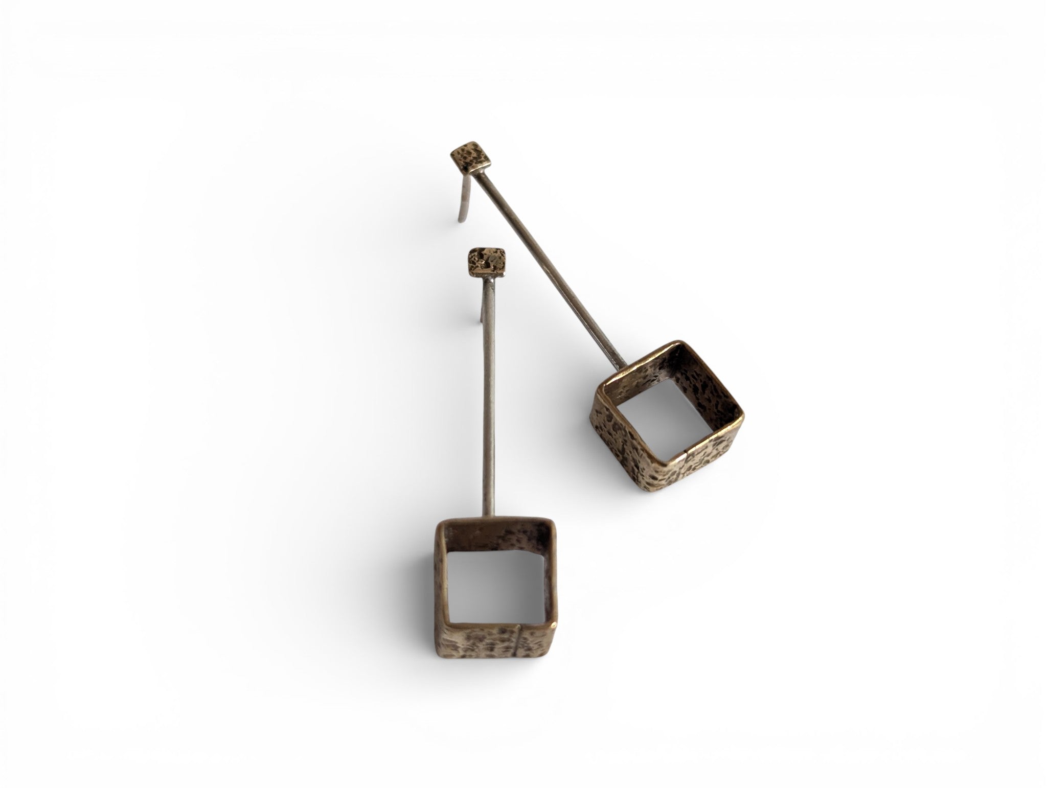 Sterling silver earring and brass blocks