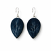 A pair of teardrop-shaped drop earrings with a dark navy blue background and a light gray branch or tree-like pattern, suspended from silver fishhook wires on a plain white background.