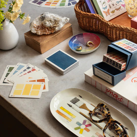 watercolor swatch playing cards with oval trays and books