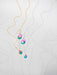 multi-colored hammered drop earrings and pendant necklace