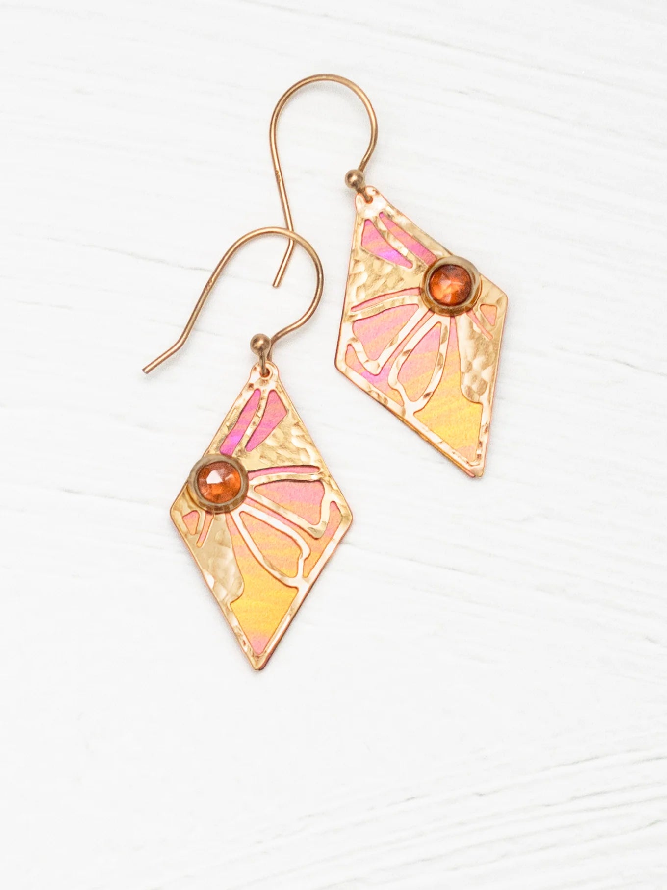 gold earrings with orange gemstone