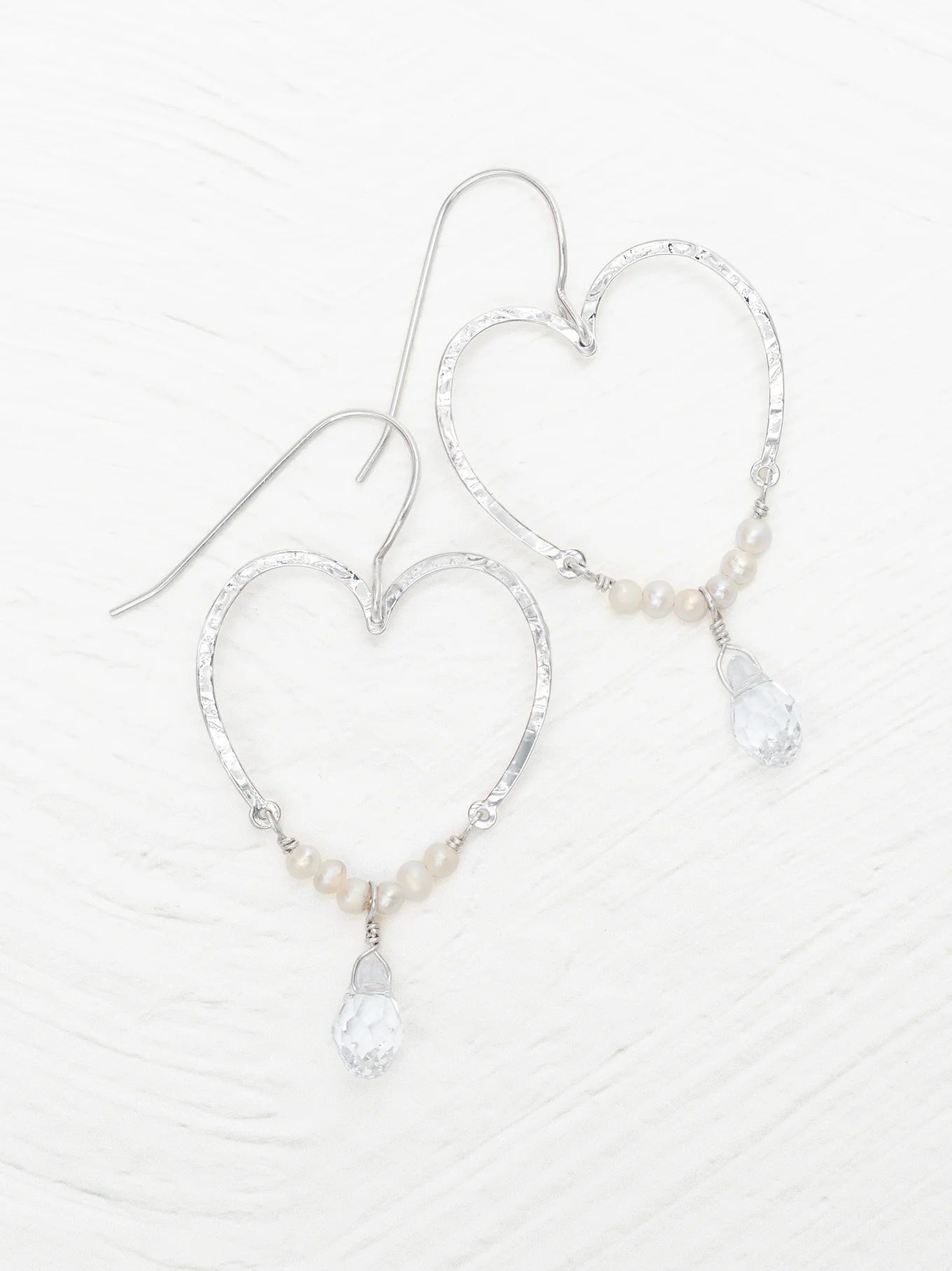 heart earring with pearls and gemstone