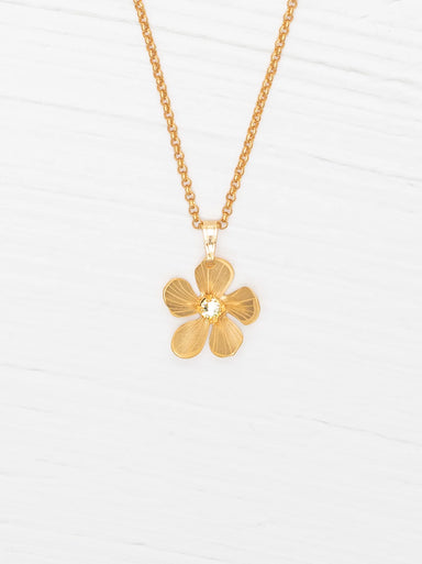 gold plumeria pendant necklace with gemstone