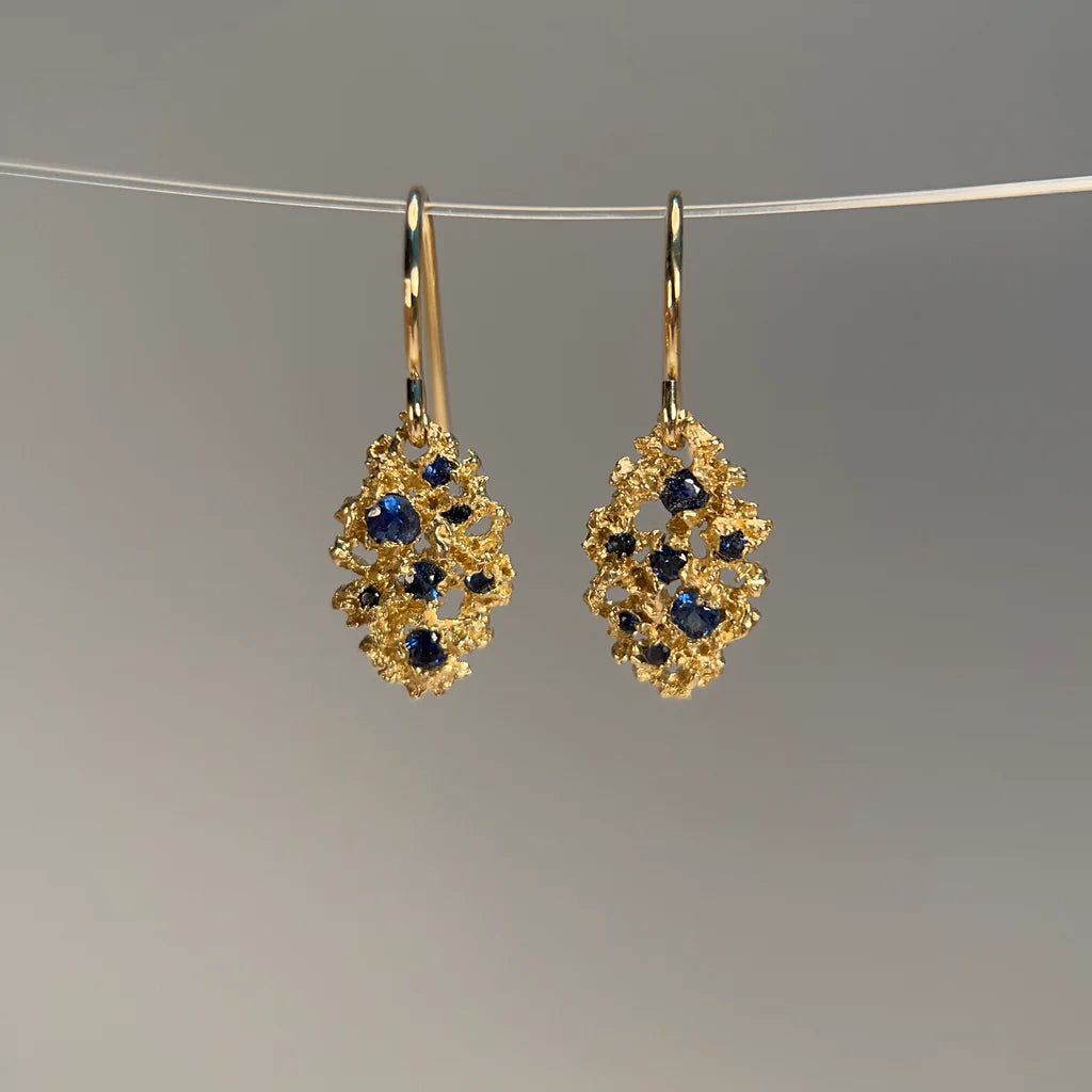 Gold drop clustered earrings with blue stones