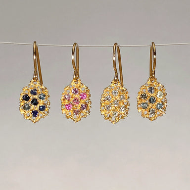 Four pairs of gold clustered earrings with gemstones 