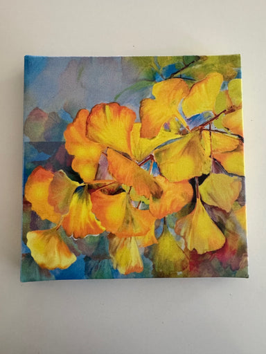 8x8 canvas print of a vibrant digital painting featuring colorful ginkgo leaves, created by Hearts for the Arts, titled 'For The Love of Light'. This original artwork is available for bidding and supports art education.