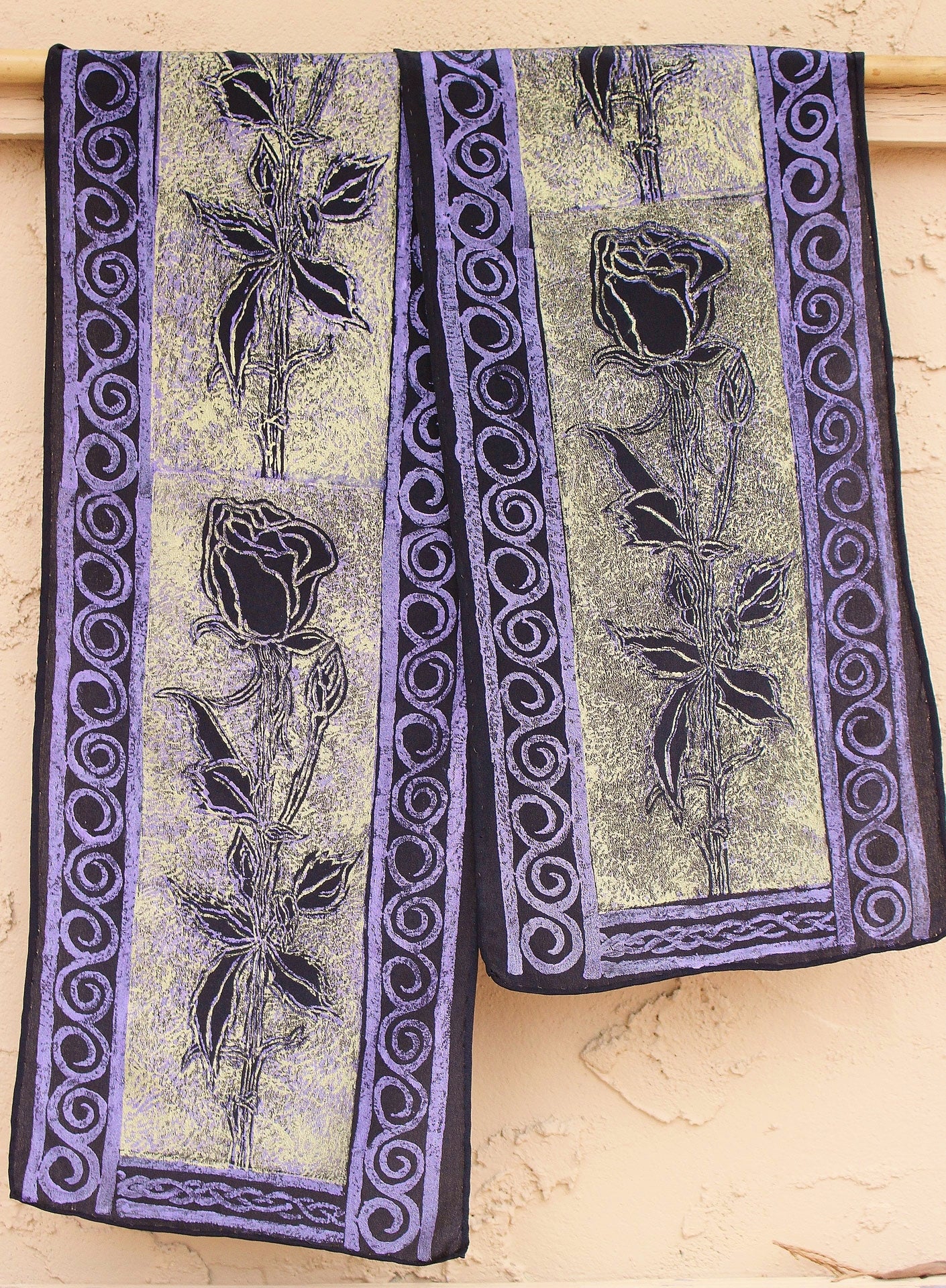 Beautiful stemmed rose scarf by Jody Bare, featuring original purple and gold lino-cut block prints on black crepe de chine, perfect for adding elegance to any outfit.