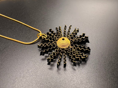 Breeze Chic | The Sun Necklace, handcrafted eco-friendly quilled paper sun pendant on an adjustable chain