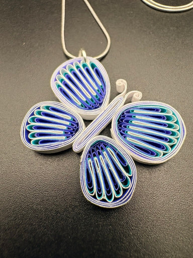 Breeze Chic | White-Blue Butterfly Necklace handcrafted from eco-friendly quilled paper with an adjustable chain