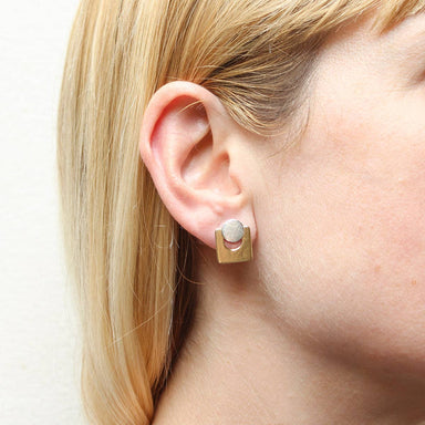 Small Disc with Cutout Square Post Earrings by Marjorie Baer showcasing a silver hammered design layered over a rounded cutout square, perfect for an architectural and stylish look.