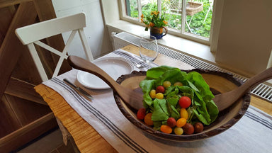 black walnut salad bowl on a table setting