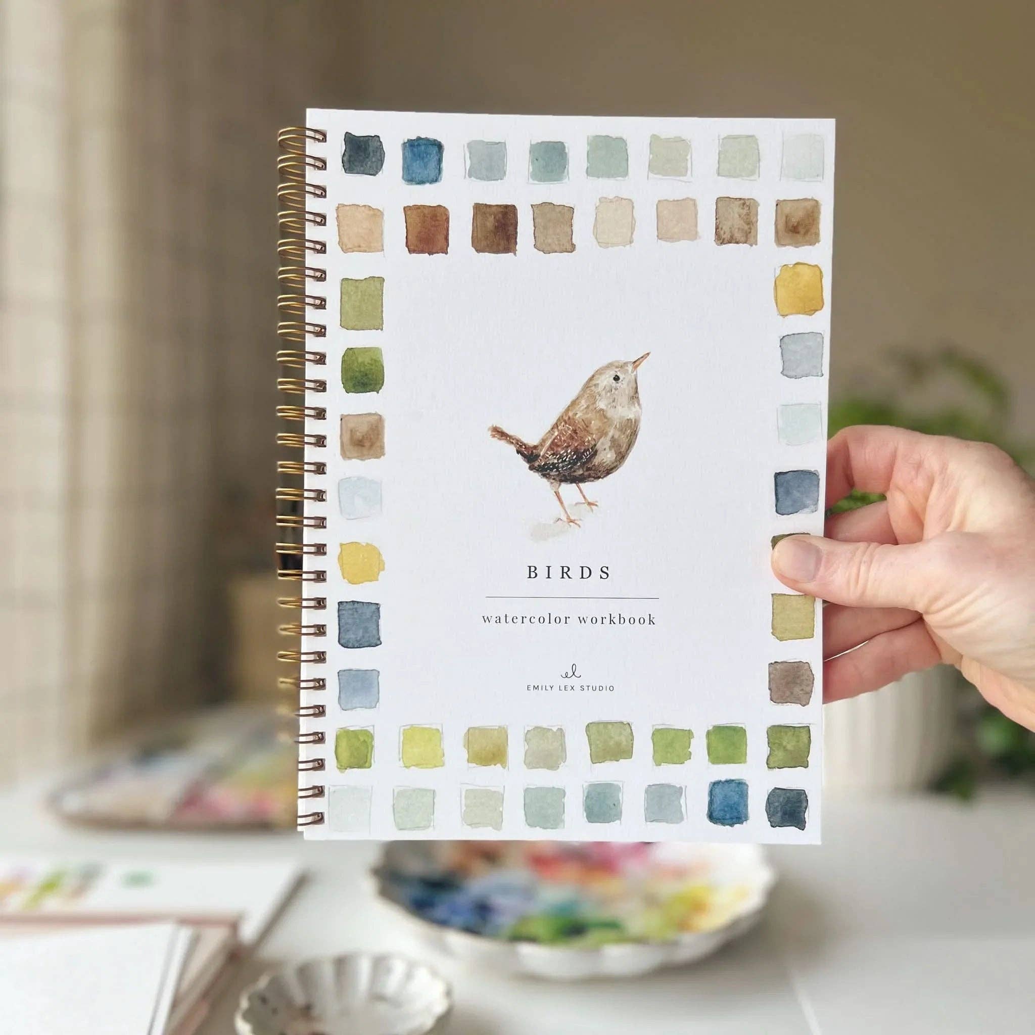 A beautifully painted bird from the Birds Watercolor Workbook, demonstrating the artistic potential for both beginners and experienced painters.