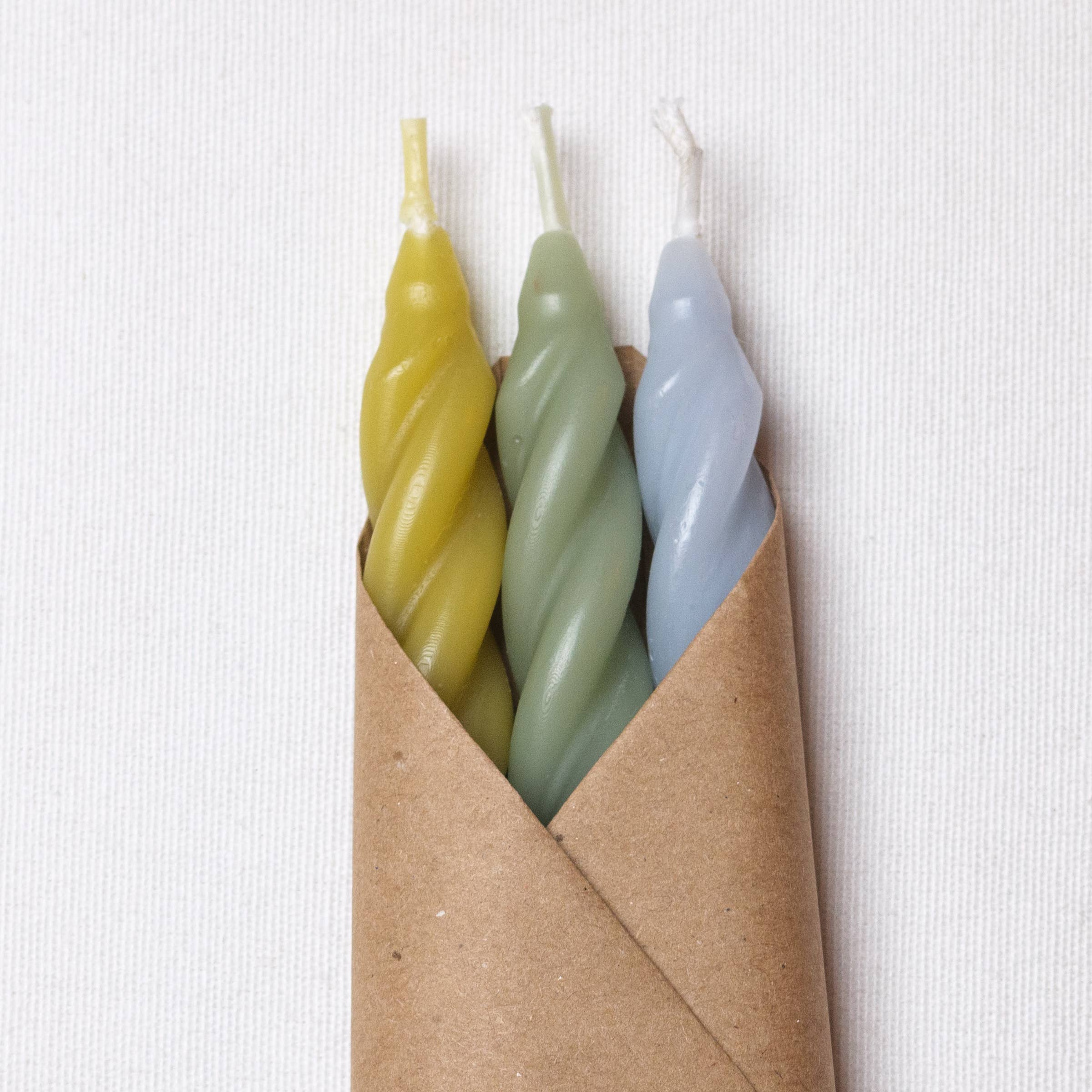 Wrapped Beeswax Spiral candles by Cave glow studio