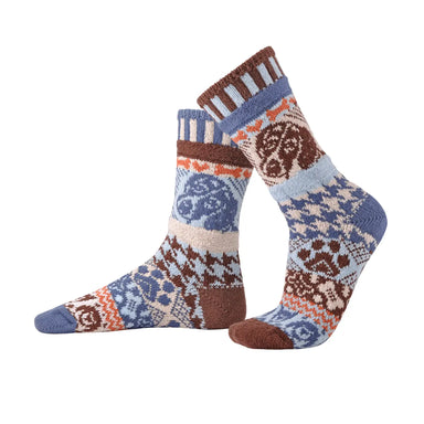 Colorful Dog Crew Socks by Solmate Socks featuring a mix of powder blue, bone, steel blue, spice, and dark brown patterns, perfect for animal lovers and eco-friendly fashion.