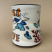 XLarge Lucky Sea Turtle Cup by The Bowl Maker depicting an artistic scene with a whale and sea-themed elements alongside the words 'Just Love'.
