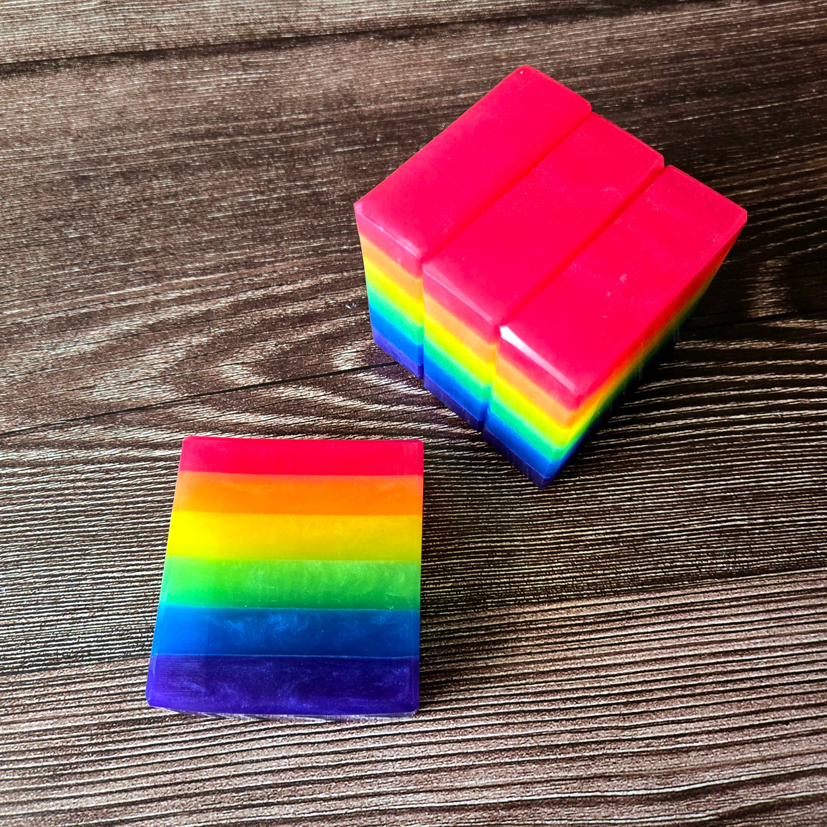 Rainbow Pride Handcrafted Soap by Pretty Soap Co. showcasing vibrant colors of the LGBTQ+ Pride Flag in a beautifully wrapped eco-friendly package.