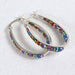 Colorful Crystal Hoop Earrings by Mosaico Jewels, featuring a vibrant inlay of multicolored crystals in a distinctive hoop design.