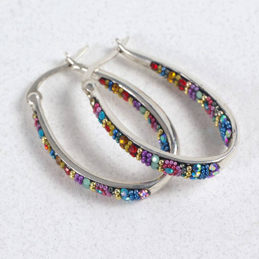 Colorful Crystal Hoop Earrings by Mosaico Jewels, featuring a vibrant inlay of multicolored crystals in a distinctive hoop design.
