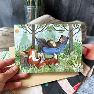 Bear in a hammock with a fox blank greeting card