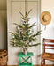 Tree decorated with Vintage-style  art locket ornaments.
