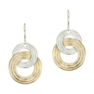 Close-up view of Interlocking Rings Wire Earrings in brass and silver with ripple texture, showcasing modern sculptural design by Marjorie Baer.