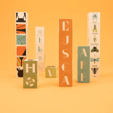 Uncle Goose Bug Blocks close-up of insect on a vibrant wooden block - where creepy crawlies meet fancy letters! Perfect for curious kids and design-savvy adults.