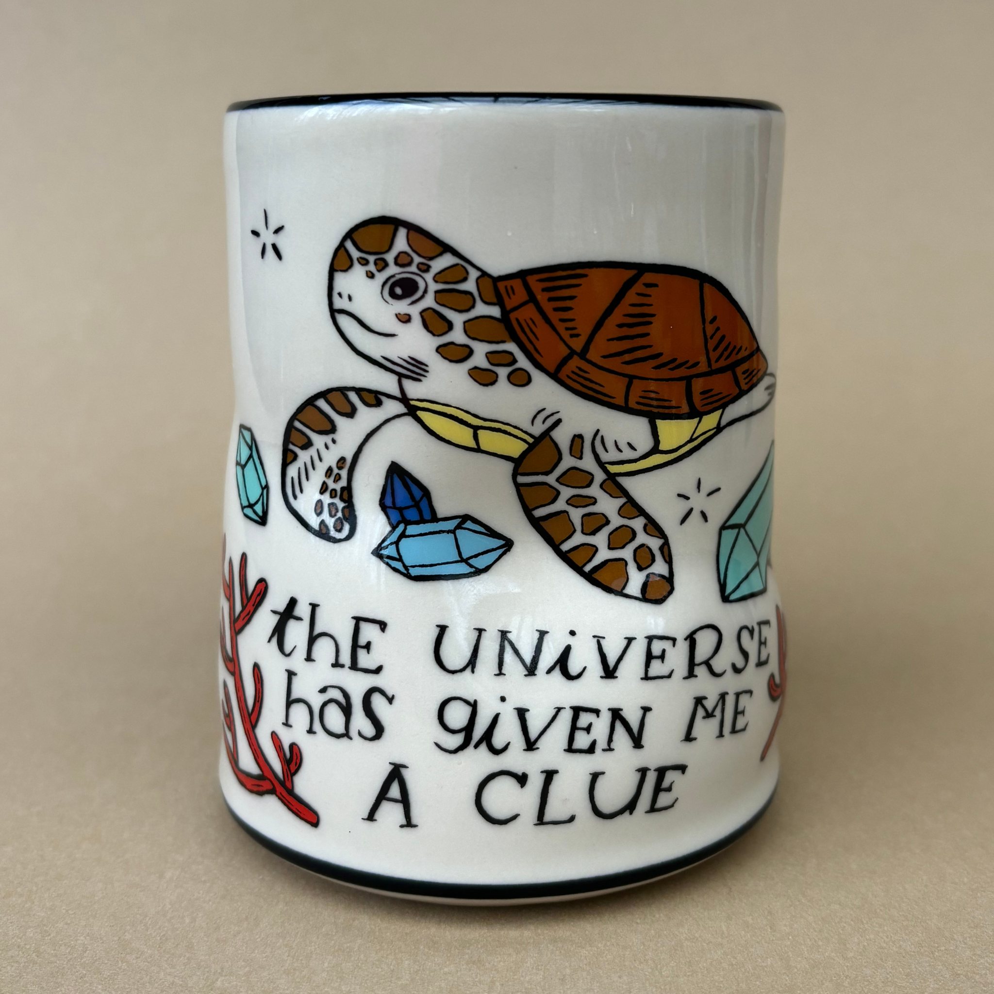 Close-up of the Lucky Sea Turtle Cup - XLarge featuring a detailed sea turtle illustration and uplifting text, showcasing the unique artistry of The Bowl Maker.
