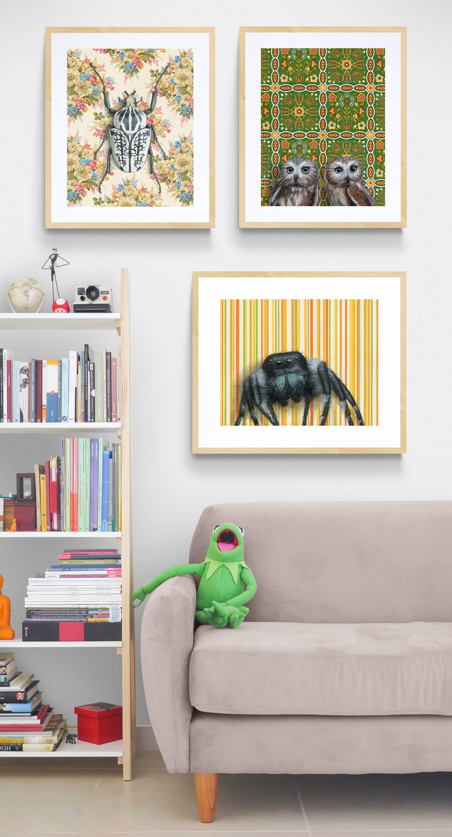 3 framed art prints above a couch in a room